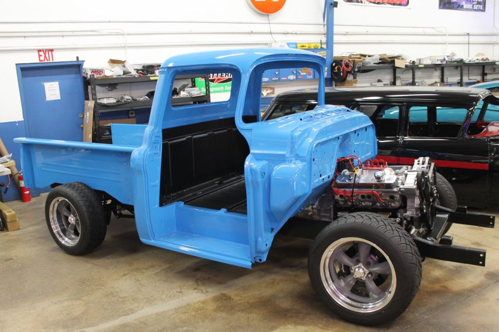 I purchased the 1955 Chevy 3100 because I have always liked them since high school. I searched for about a year until I found one listed on Craigslist locally. I went out to look at it and found it to be owned by a contractor (similar to myself) that has enjoyed tinkering with cars/trucks since his high school days (similar to myself). He told me that he had purchased this truck with the intent to “tinker” around with it but never did much with it other than take his wife out on Friday night “date nights” due to the many other car/truck projects he had going on. I purchased the truck with the intent of “tinkering” with it myself and brought it back to my shop. My initial thought for this truck was to install an Art Morrison frame (their shop is very close to mine), install a new Chevy motor/trans along with wheels/tires while leaving the body and interior untouched. In going down the road to do so, I spoke to Art Morrison about painting the frame and they referred me to MetalWorks who buys, sells, and paints a lot of their frames. After talking to MetalWorks, I found that I could purchase the Art Morrison fame through them for less than I could purchase it directly from Art Morrison, therefore the decision was made to move ahead with MetalWorks for the purchase and painting of my frame. After sourcing the engine/trans, wheels/tires and misc. other parts I started thinking that this is going to be a real nice truck therefore I should probably have it painted and put in another call to MetalWorks inquiring about painting. MetalWorks explained to me that they could paint the truck however to do so, they required that they would have to disassemble and reassemble themselves. This made total sense to me, however it pretty much took the entire build out of my hands and into theirs. This actually worked out OK for me because as it turned out the construction industry in Western Washington was so busy I wouldn’t have had any time to work on it myself. 